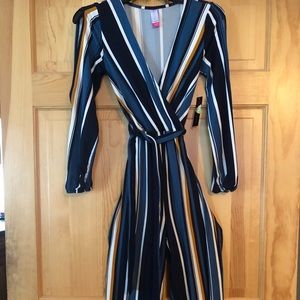 One piece pant suit (never worn)